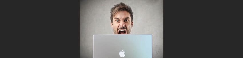 angry millennial on macbook